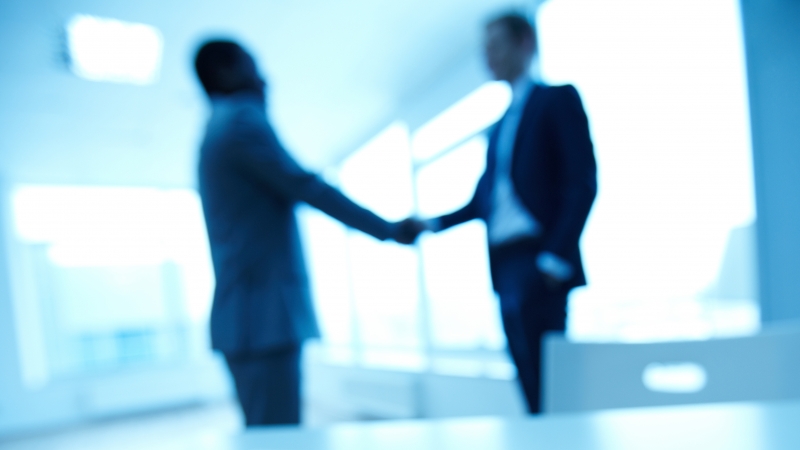business men shaking hands